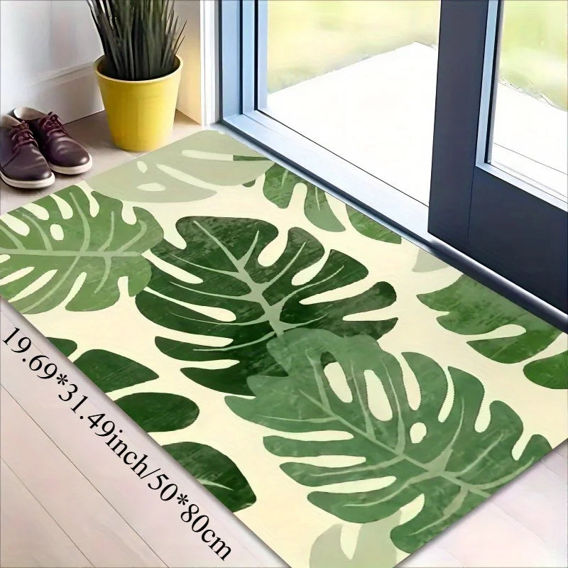 Tropical leaf print non-slip doormat, green Monstera design carpet on light beige background, ideal for living decoration