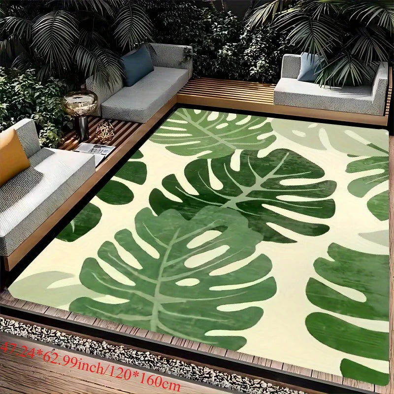 Tropical leaf print non-slip doormat, green Monstera design carpet on light beige background, ideal for living decoration
